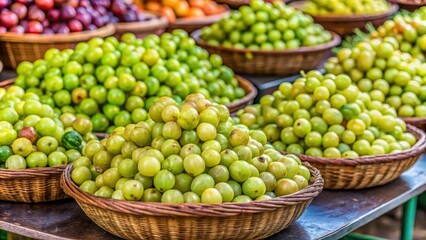 Fresh Amla fruits beautifully displayed on an Indian open market stall , Amla, Indian gooseberry, market, fruit