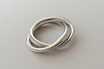 Naklejka premium Two intertwined rings on a plain light gray background Valentine’s Day card