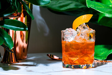 Grapefruit negroni, alcoholic cocktail drink with juice, gin, sweet vermouth, bitter and peel....
