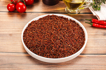 Red raw dry rice gor cooking