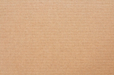 Cardboard sheet texture background, detail of recycle brown paper box pattern.