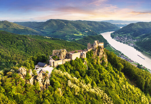 Austria - Burg Aggstein, Beautiful landscape with castle ruin and Danube River at sunset in Wachau valley Austria.