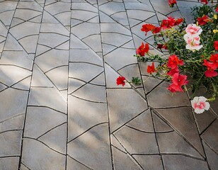 A beautiful arrangement of flowers scattered on a tiled floor, creating a soft and colorful