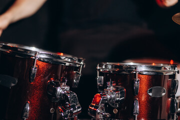 Drums and drum set. Beautiful special effects of lighting. Musical instrument. The concept of...