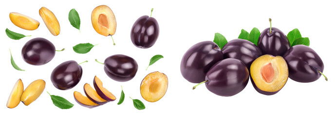 fresh purple plum and half with leaves isolated on white background with copy spase for your text....