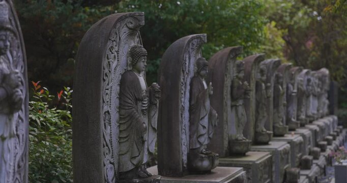 A religious stone statues of thirteen buddhas at Japanese buddhism temple