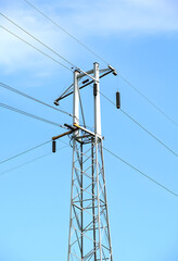 High voltage post or High voltage tower, close-up, with white tones