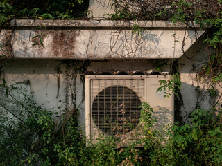 dirty air conditioner system on the abandoned building
