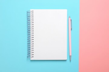 A clean notebook and a pen are symmetrically placed on a pastel background, creating a minimal and modern aesthetic ideal for creative projects and stationery displays.