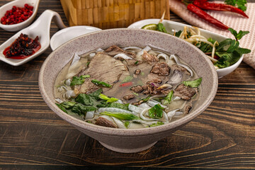 Vietnamese Pho Bo soup with beef and noodles