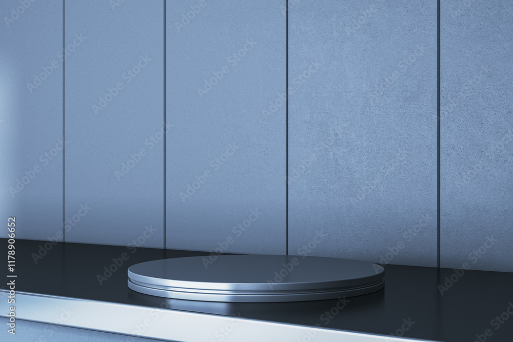 Poster modern round pedestal on a sleek black base against a blue panel wall in an interior design concept 