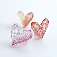Valentine's Day Crystal Glass Hearts Pink and Red Decor Romantic Setting Artistic Display Close-Up View