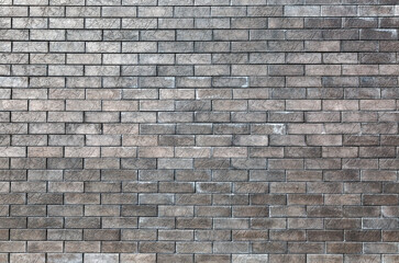 Gray brick wall as a creative background. Brick wall texture