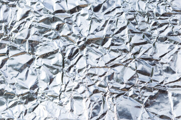 Abstract crumpled silver paper texture background, blank wrinkle paper pattern background