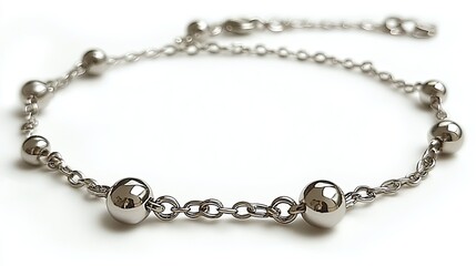 Silver beaded bracelet on white background, studio shot, jewelry design, fashion accessory.