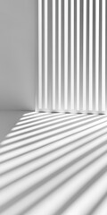 Fototapeta premium Sunlight creates striking striped shadows on a white wall through vertical blinds, showcasing minimalist interior design.