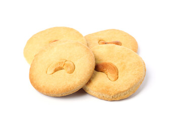 Many tasty cashew cookies isolated on white