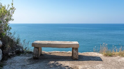 Cliff view with a stone bench at the edge, offering a peaceful spot to enjoy the panoramic scenery.