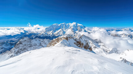 Fototapeta premium Breathtaking mountain view with snow covered peaks and clear blue sky