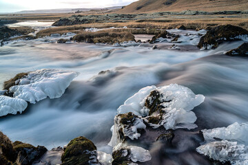 Panoramic view of flowing rushing water on the river in Kirkjubæjarklaustur or...
