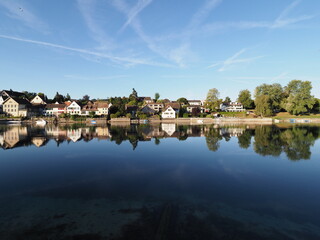 Fototapeta premium Countryside at Rhine River in European STEIN AM RHEIN town in SWITZERLAND