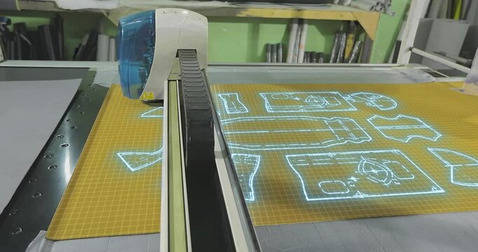 Visualization of a smart industrial Fabric Cutting Machine. Smart industrial Fabric Cutting Machine. Cutting fabric on cutting equipment. Industrial Fabric Cutting Machine, close-up.