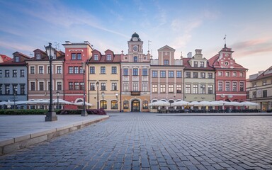 Fototapeta premium Colorful historic town square at sunrise.
