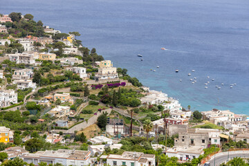 Obraz premium View from viewing terrace at Umberto I Square (La Piazzetta) of city and sea ​​coast, Capri Island, Italy
