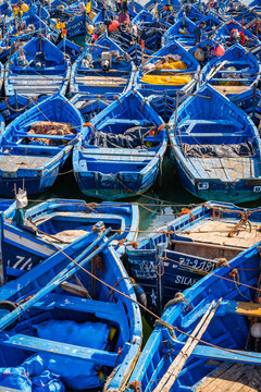 Blue fishing boats docked at the port, Essaouira, Morocco