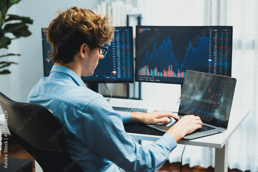 Aufkleber working young business trader typing, focusing on laptop in market stock graph data investment in re