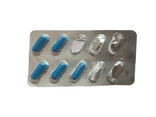 A blister pack filled with blue and white pills.
