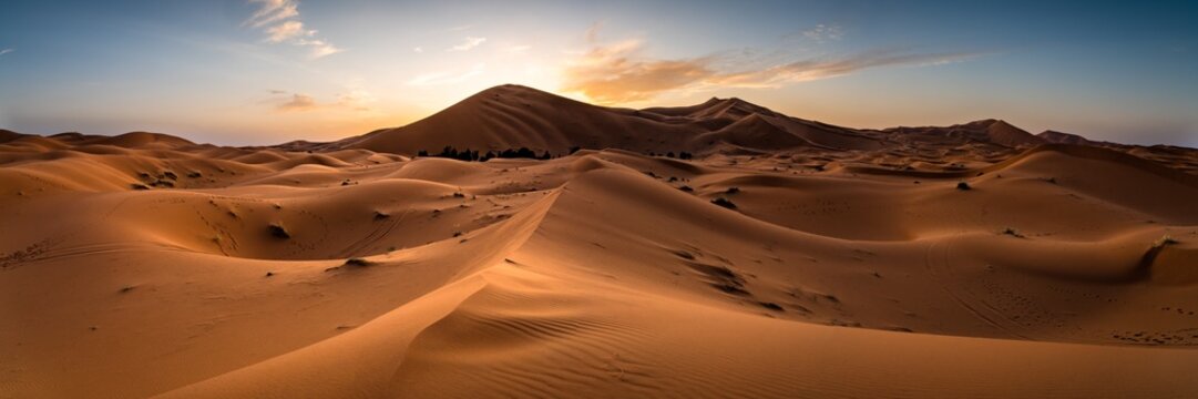 Sunset over the sand dunes in the Sahara desert, Merzouga, Morocco