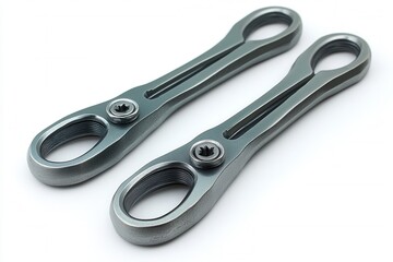 Obraz premium Two metal link connectors designed for mechanical applications.