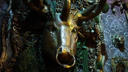 Russia Saint Petersburg 11.11.2024 Close-up shot of a statue depicting a deer's head, perfect for use in nature-inspired designs or illustrations.