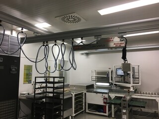 High-Tech Industrial Workspace with Air-Handling System and Equipment