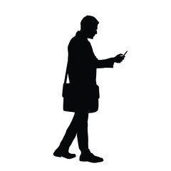 Silhouette of a businessman or employee with a briefcase while using a cell phone