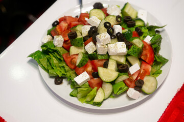 salad with fresh vegetables and feta cheese .Greek salad