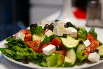 salad with fresh vegetables and feta cheese .Greek salad