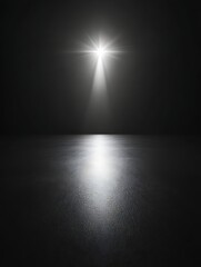 Bright spotlight on dark floor.