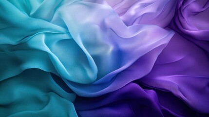 Obraz premium Abstract ombre silk fabric texture background in teal, blue, and purple hues.