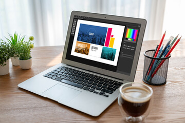 Fototapeta premium Graphic designer software for modern design of web page and commercial ads showing on the computer screen
