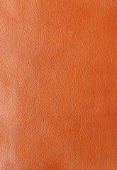 Texture of genuine leather, artificial leatherette brown background