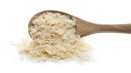  Rice flakes in wooden spoon, isolated on white