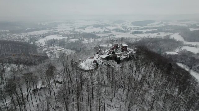 Aerial view ruins of old castle. Winter. Ruin of Hohnstein Castle, Harz mountains, Germany.