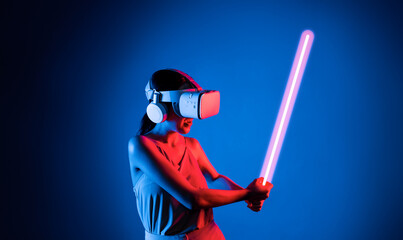 Smart female standing wearing VR headset connecting metaverse, future cyberspace community...