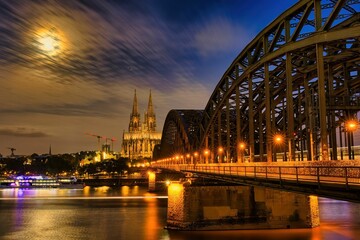 Fototapeta premium Cologne Cathedral and Hohenzollern Bridge at Night