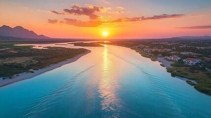 Fototapeta premium Sunset serenity over tranquil river coastal landscape aerial view