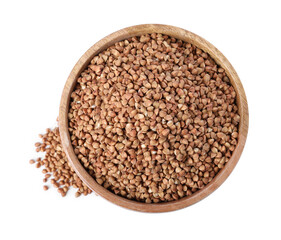 Raw buckwheat in bowl isolated on white, top view
