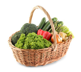 Different fresh vegetables in wicker basket isolated on white