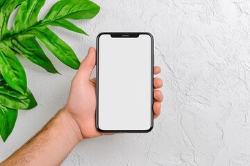 A photostock of a hand holding a smartphone with a blank screen ready for design mockups or app demonstrations, placed on a white background. High Quality